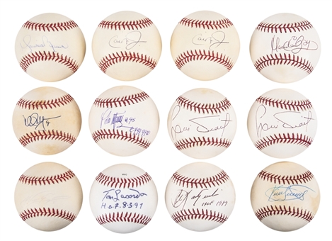 Lot of (12) Hall of Famers and Stars Single Signed Baseballs Including Kirby Puckett, Carl Yastrzemski, Pedro Martinez, Mark McGwire and Cal Ripken Jr (JSA Auction LOA)